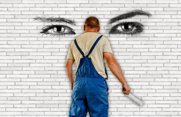 painter painting wall